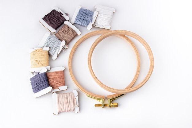Embroidery threads and hoops flatlay